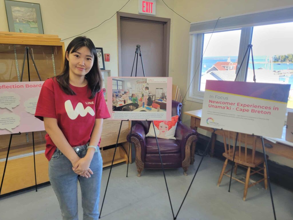 August 28, 2025 – Baddeck, Victoria County Lydia Lil joined community members at the Baddeck Library for a collaborative event featuring a public screening of You Are Here by Sari Sari, alongside the In Focus exhibit that highlights newcomer experiences in Unama’ki - Cape Breton, creating space for reflection, sharing, and conversation.