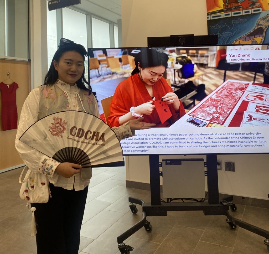 November 10, 2025 - Sydney, Nova Scotia Community College - Sydney Waterfront Campus: Yan Zhang participated in a multicultural event by engaging with students through cultural sharing and creative exchange. Drawing from her deep involvement with the Chinese Dragon Culture Heritage Association, Yan offered insight into traditional practices and community connections, fostering understanding and appreciation across cultures.